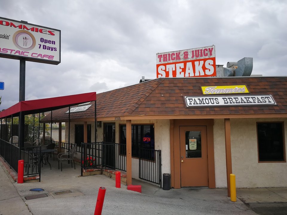 Casual diner tables with simple breakfast service.