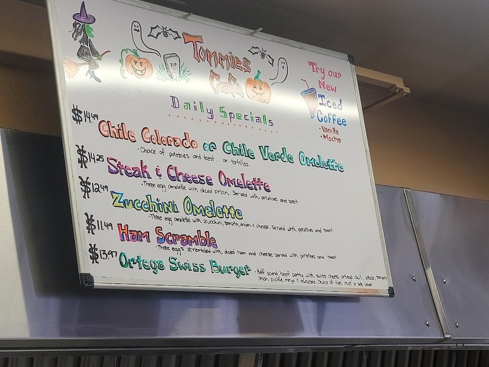 Printed menu showing breakfast, lunch, and beverages.